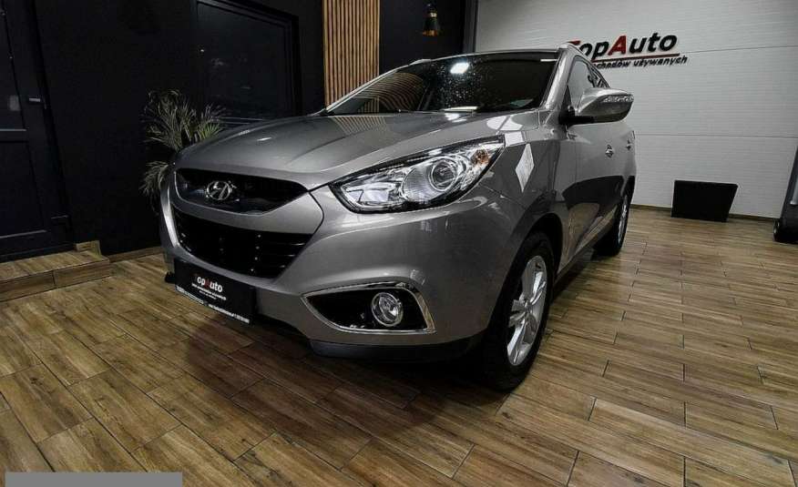 Hyundai ix35 2.0i 163km gwarancja bezwypadkowy tylko 93 000km ZAREJESTROWANY film zdjęcie 