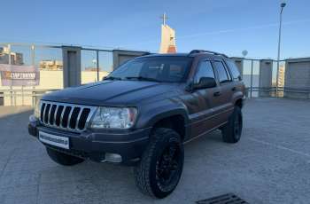 Jeep Grand Cherokee 4.7 benz+gaz Automat Kamera cofania lift 3 cale zarej. w PL