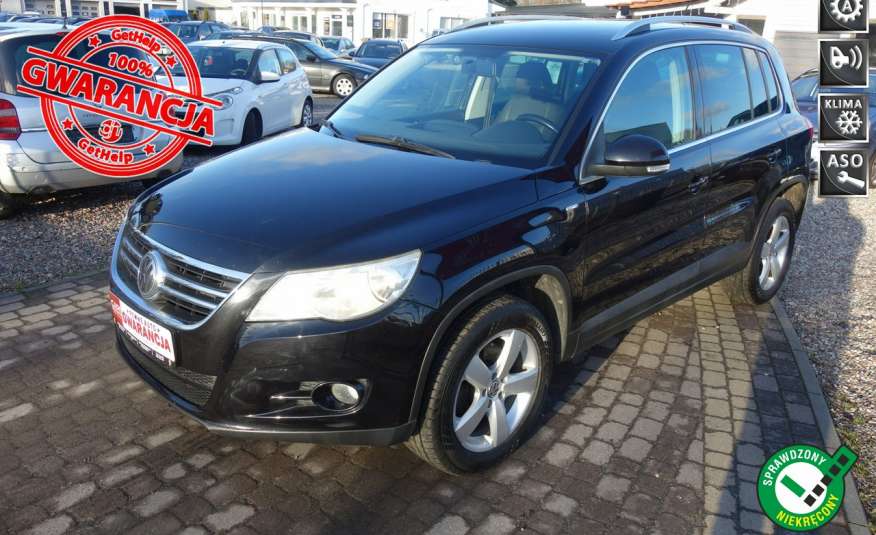 Volkswagen Tiguan 2.0TSI 200KM Automat DSG 4x4 Zarejestrowany Skóry Wolfsburg Edition zdjęcie 