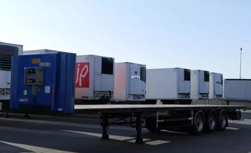 Fruehauf NACZEPA PLATFORMA / MEGA / OŚ PODNOSZONA / DO BUDOWLANKI / PODŁOGA SZYNA-DESKA / zdjęcie 