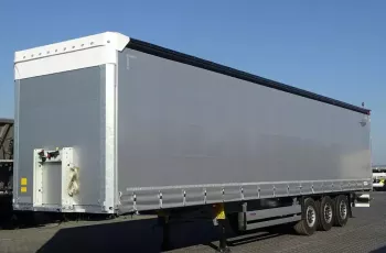 Schmitz FIRANKA / STANDARD / NOWA - OD RĘKI / OŚ PODNOSZONA /